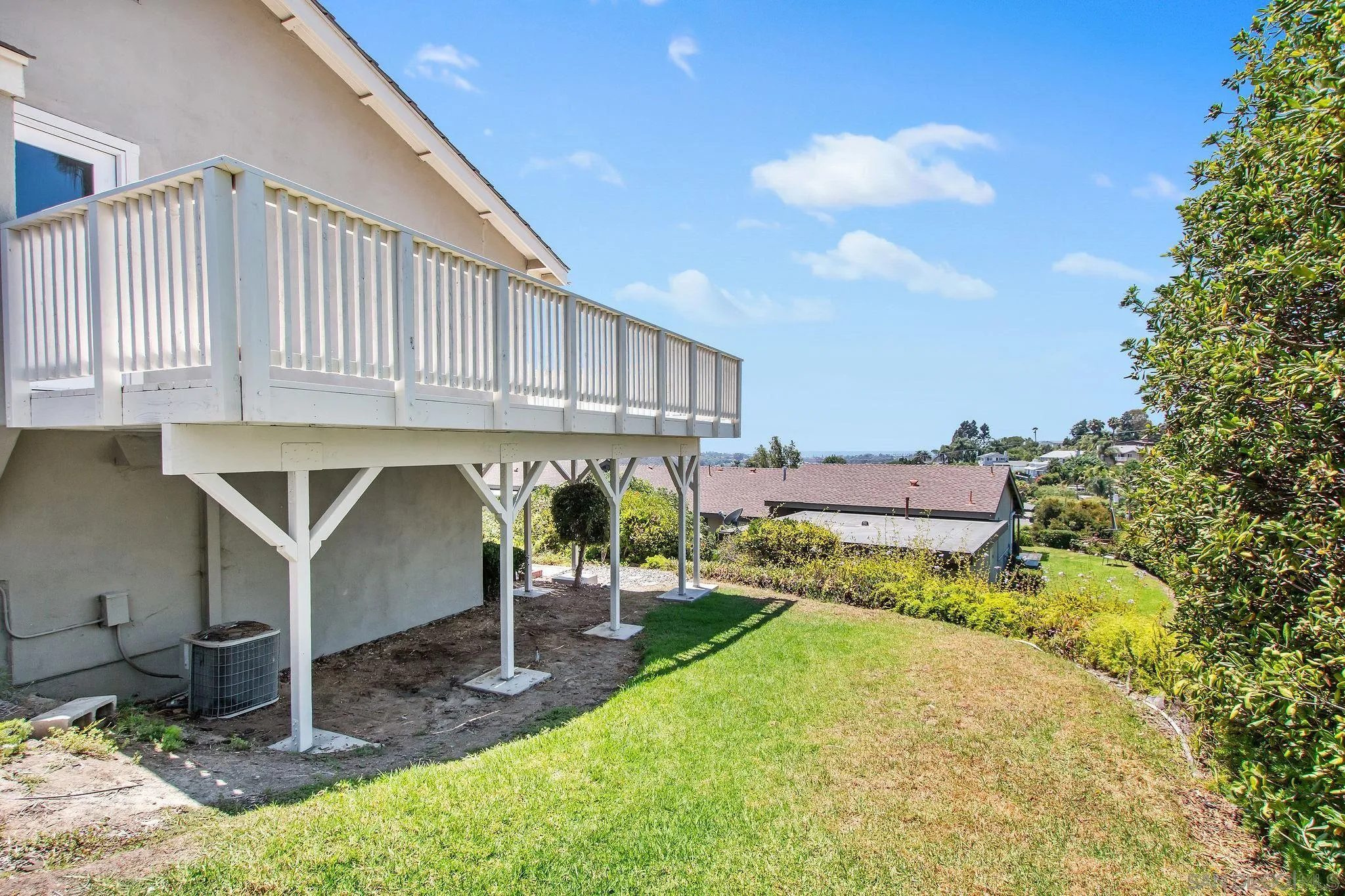 1957 Outrigger Way Oceanside, CA 92054 - Photo 26 of 32 a view of a house with backyard and sitting area