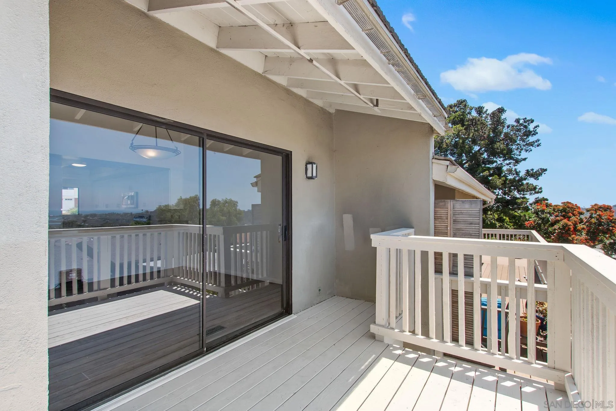 1957 Outrigger Way Oceanside, CA 92054 - Photo 8 of 32 a view of balcony with wooden floor