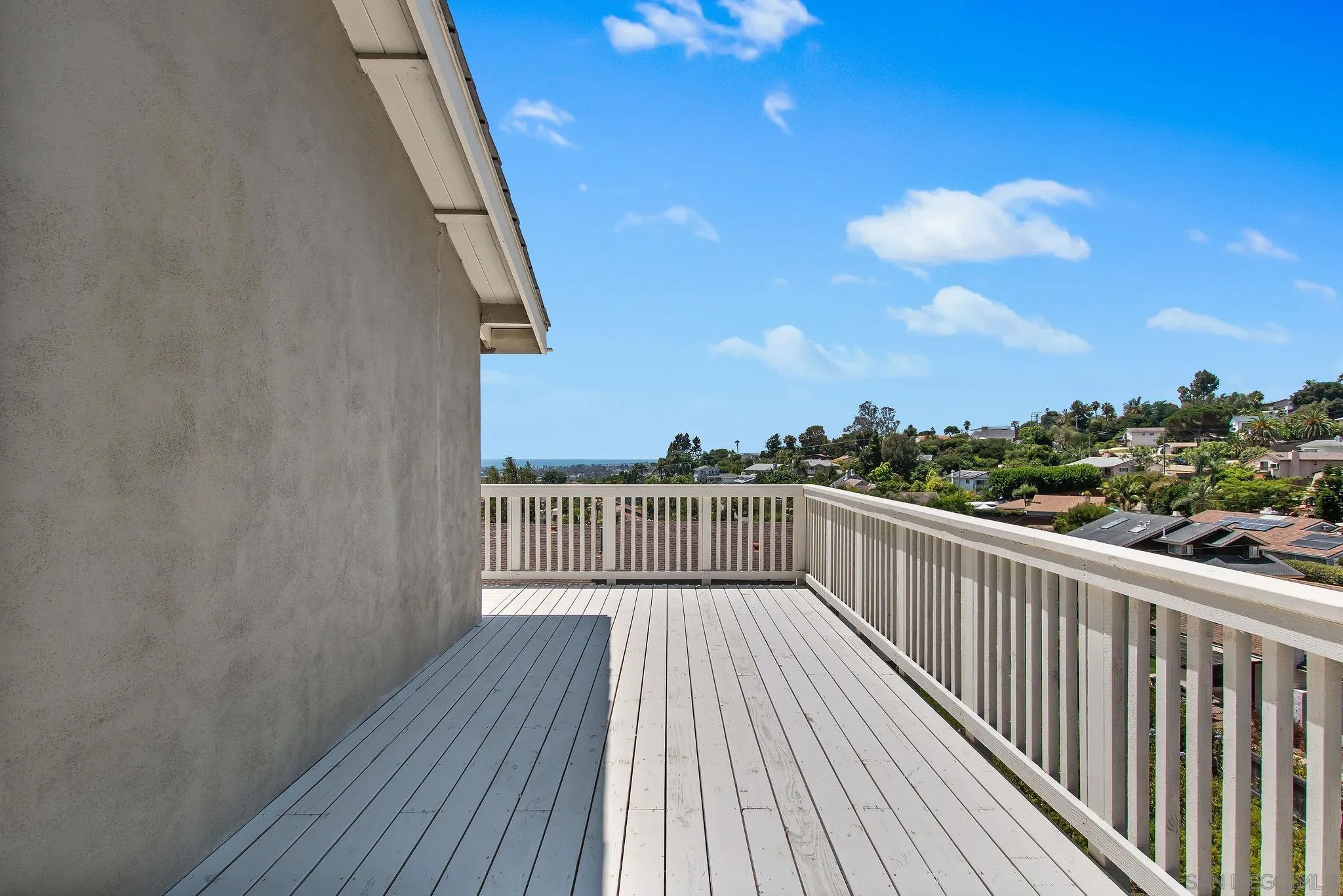 1957 Outrigger Way Oceanside, CA 92054 - Photo 9 of 32 a view of a balcony with wooden floor