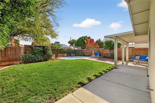 a view of a park with swings and slides