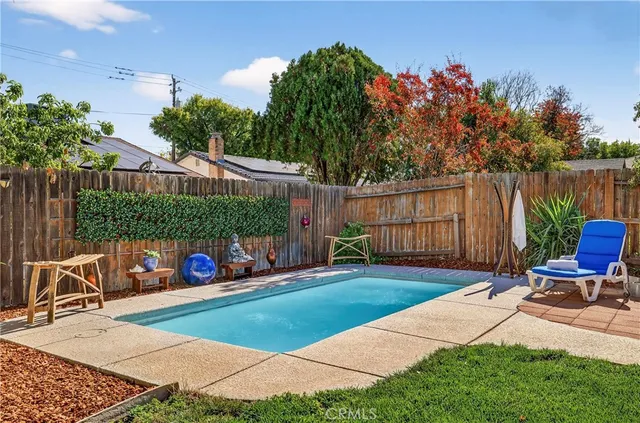 a view of a backyard with a patio