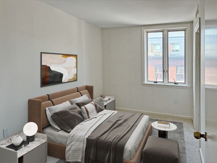 10 Rogers Street, Unit 415 Cambridge, MA 02142 - Photo 3 of 10 a bedroom with a bed and wooden floor