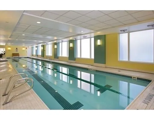 a view of an chairs and table in a balcony