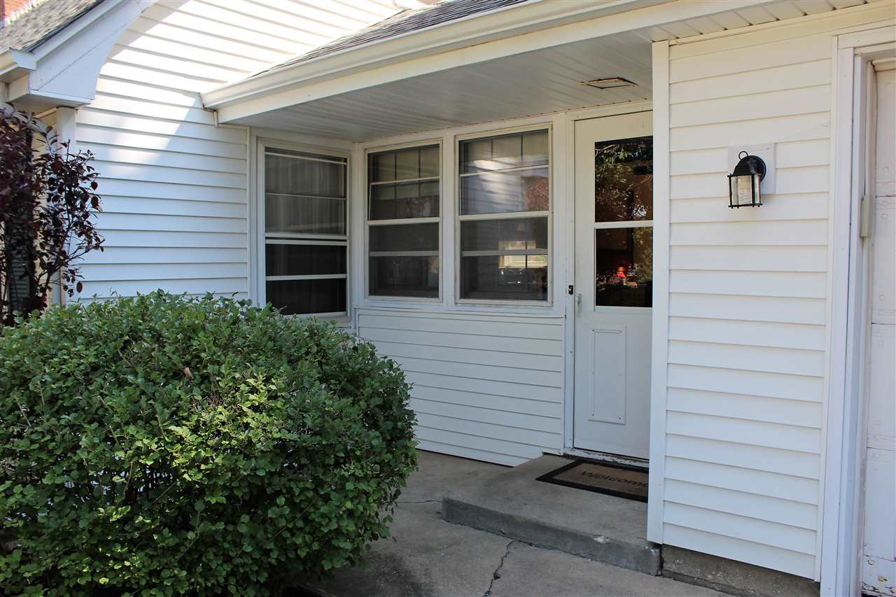 1506 Warren Road Rockford, IL 61108 - Photo 3 of 25 a view of front door and a window