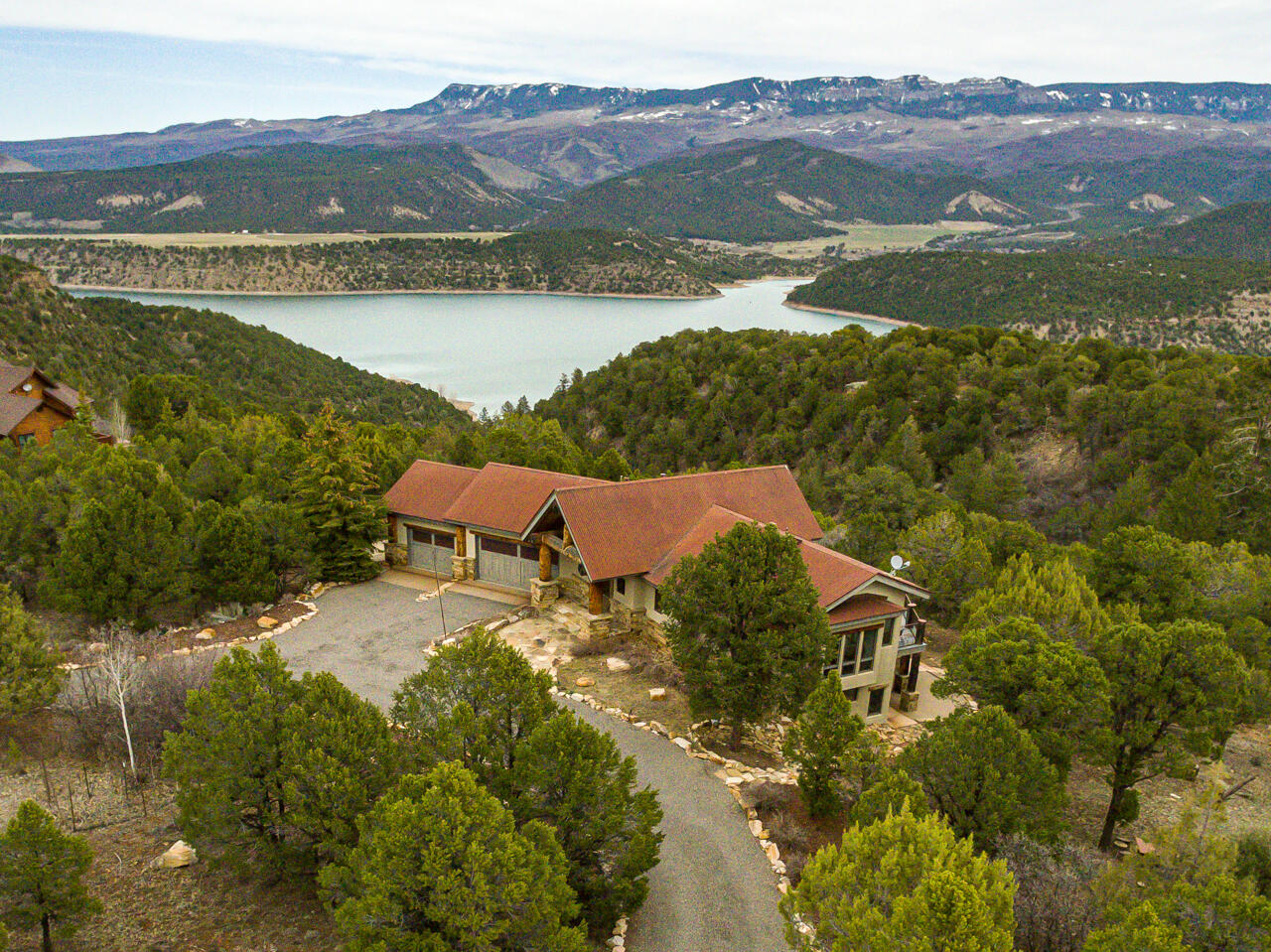 499 Waterview Lane Ridgway, CO 81432 - Photo 1 of 43 a view of a lake with a mountain