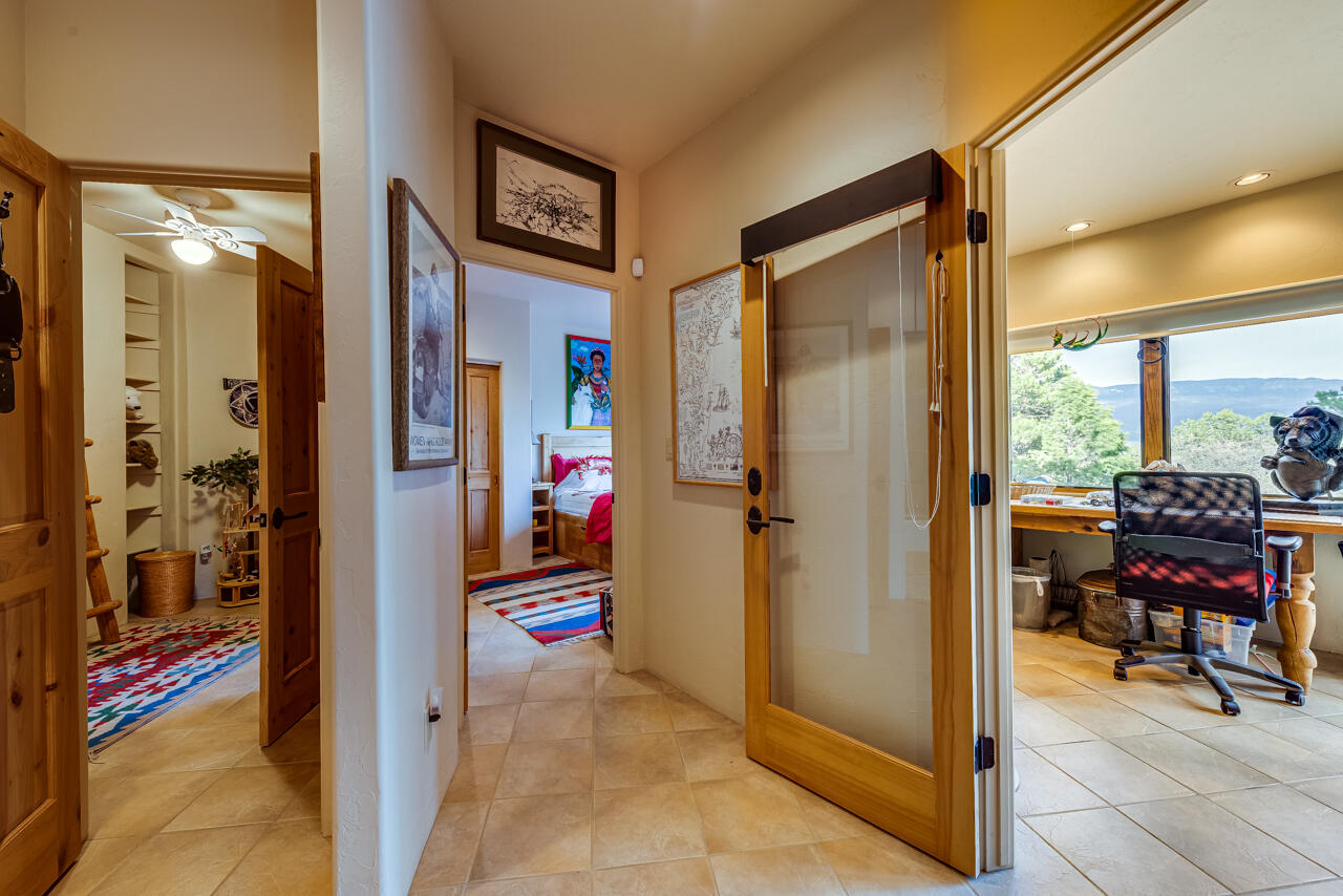 499 Waterview Lane Ridgway, CO 81432 - Photo 21 of 43 a view of elevator with a large mirror next to a bathroom