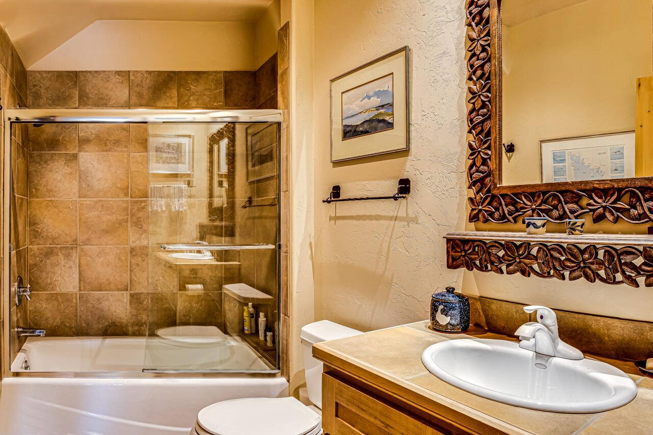 499 Waterview Lane Ridgway, CO 81432 - Photo 22 of 43 a bathroom with a sink and a mirror