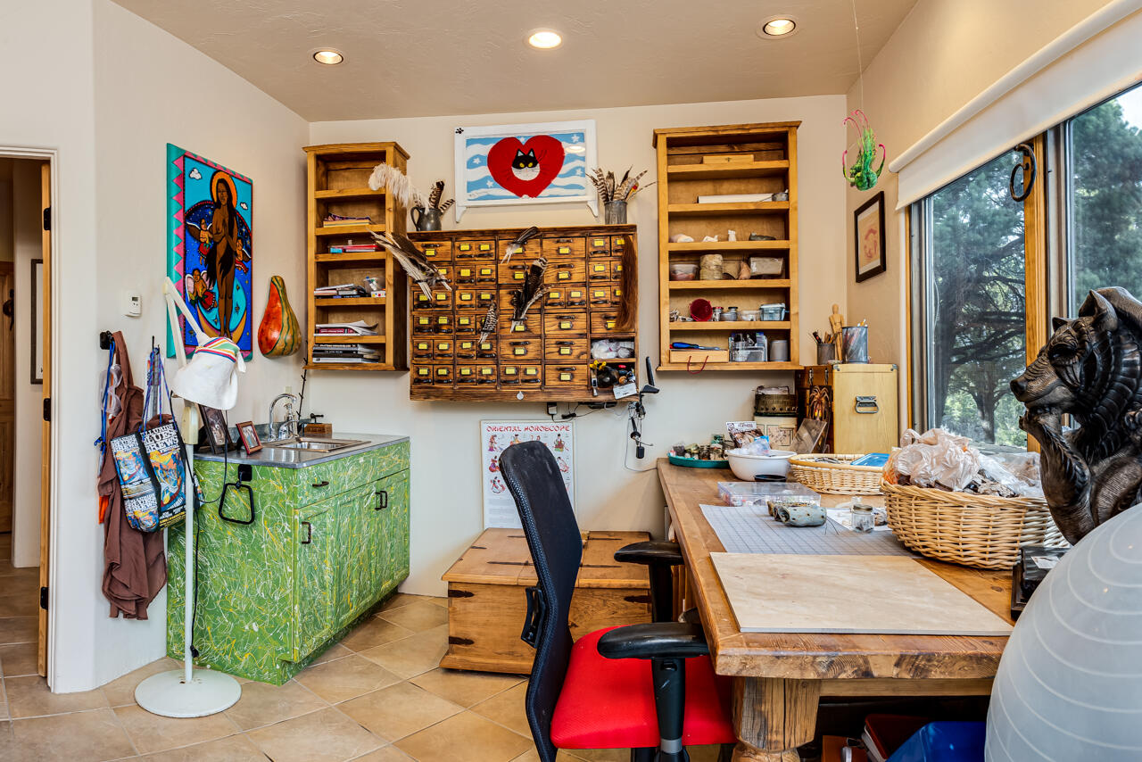 499 Waterview Lane Ridgway, CO 81432 - Photo 26 of 43 a view of a workspace with furniture and toys