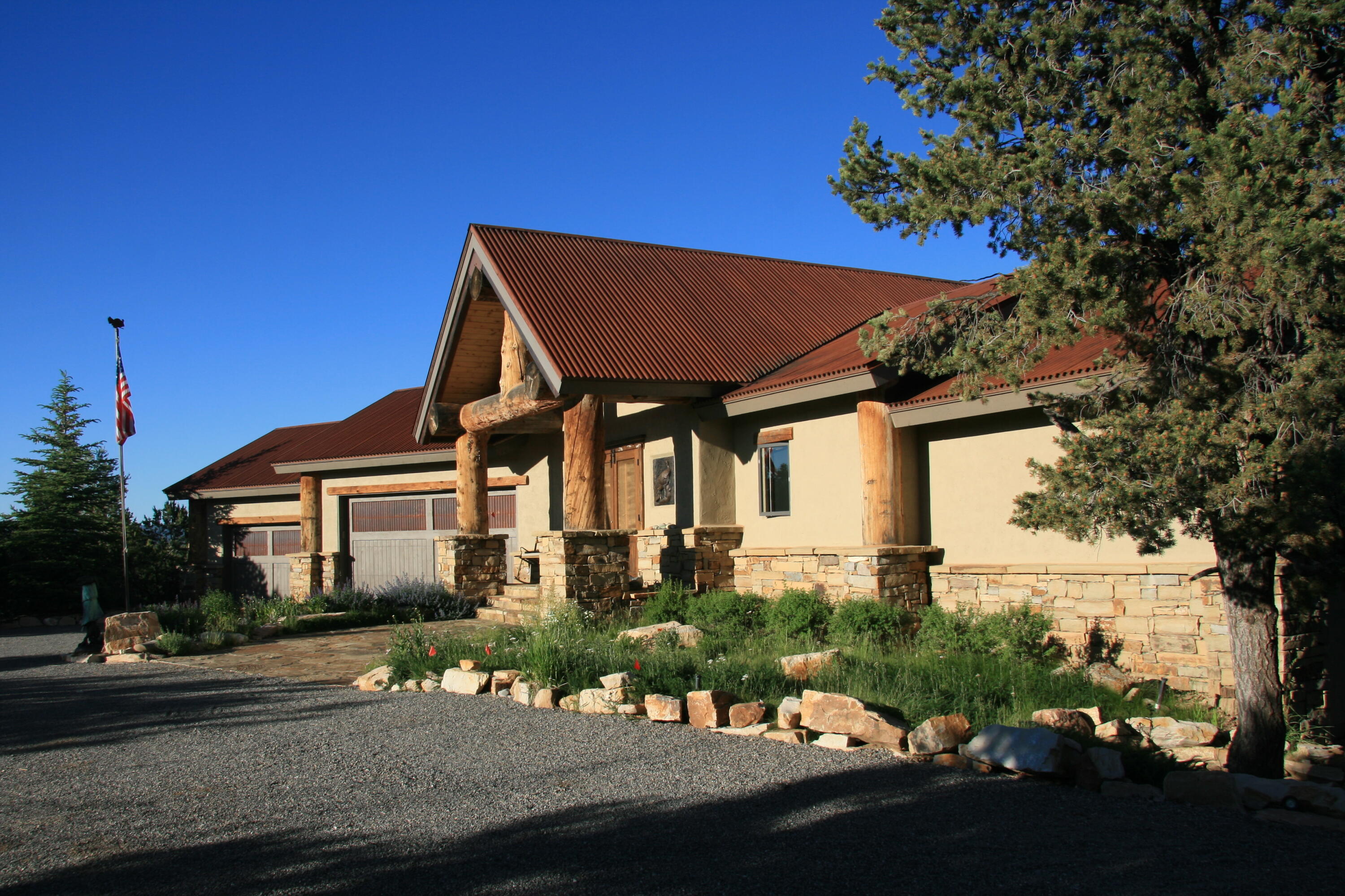 499 Waterview Lane Ridgway, CO 81432 - Photo 27 of 43 a front view of a house with a yard