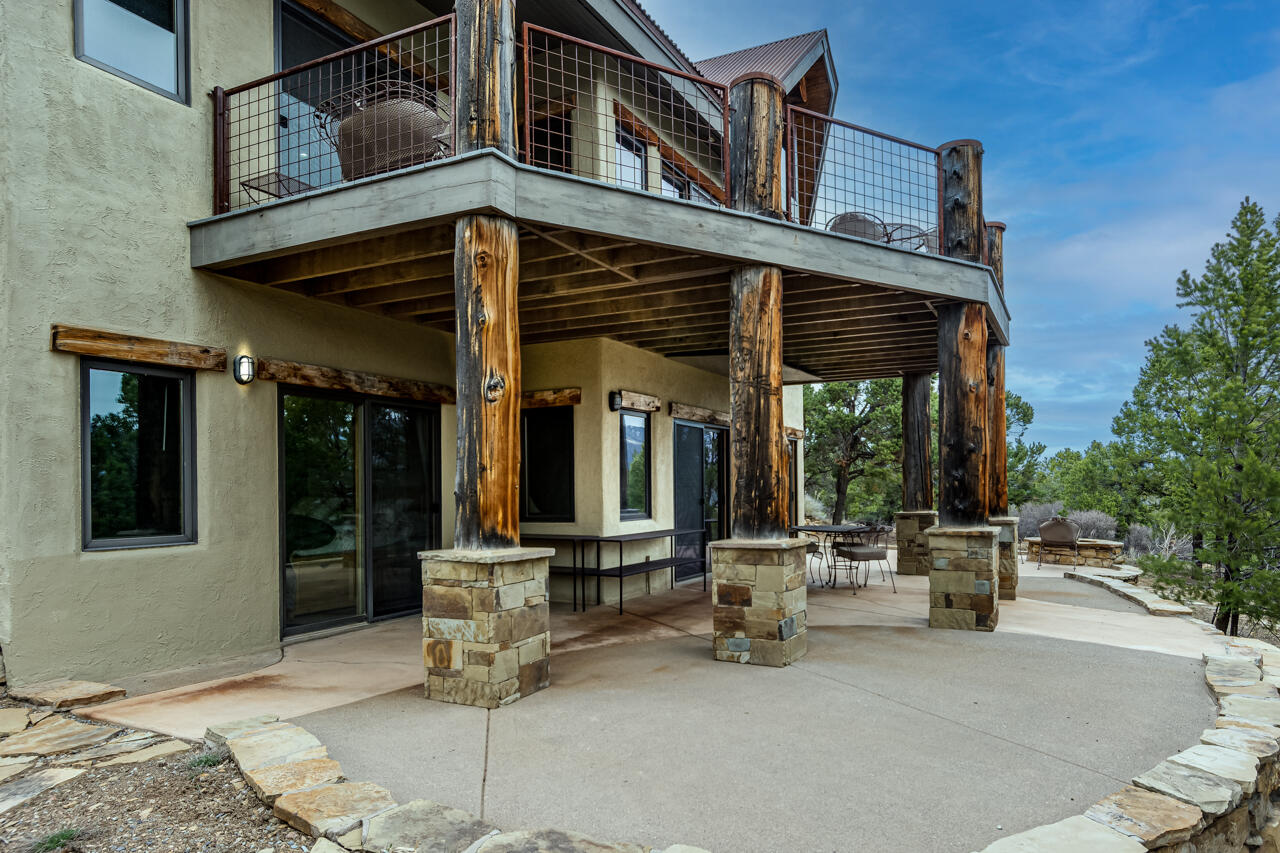 499 Waterview Lane Ridgway, CO 81432 - Photo 30 of 43 a building with table and chairs