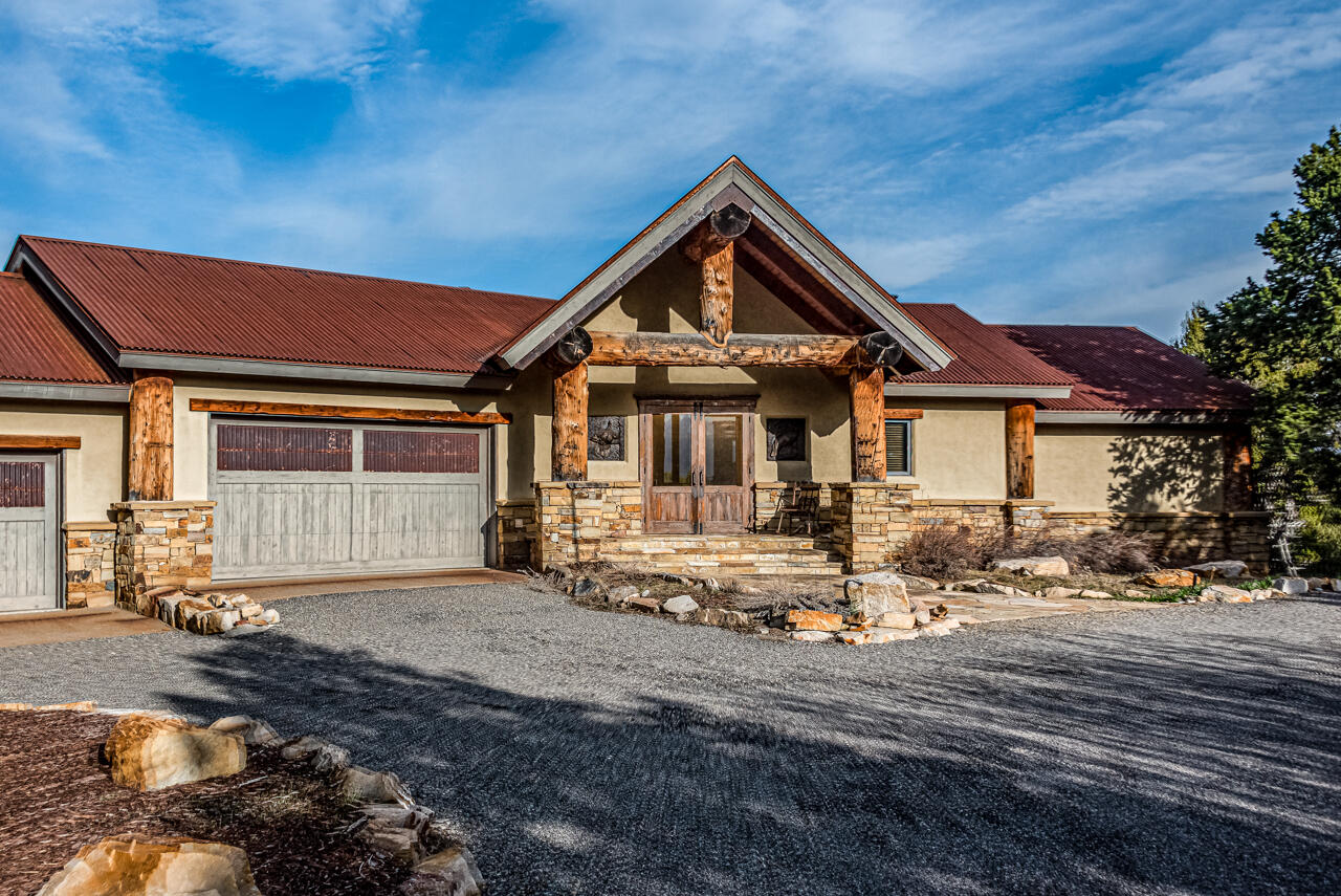 499 Waterview Lane Ridgway, CO 81432 - Photo 33 of 43 a front view of a house with a yard