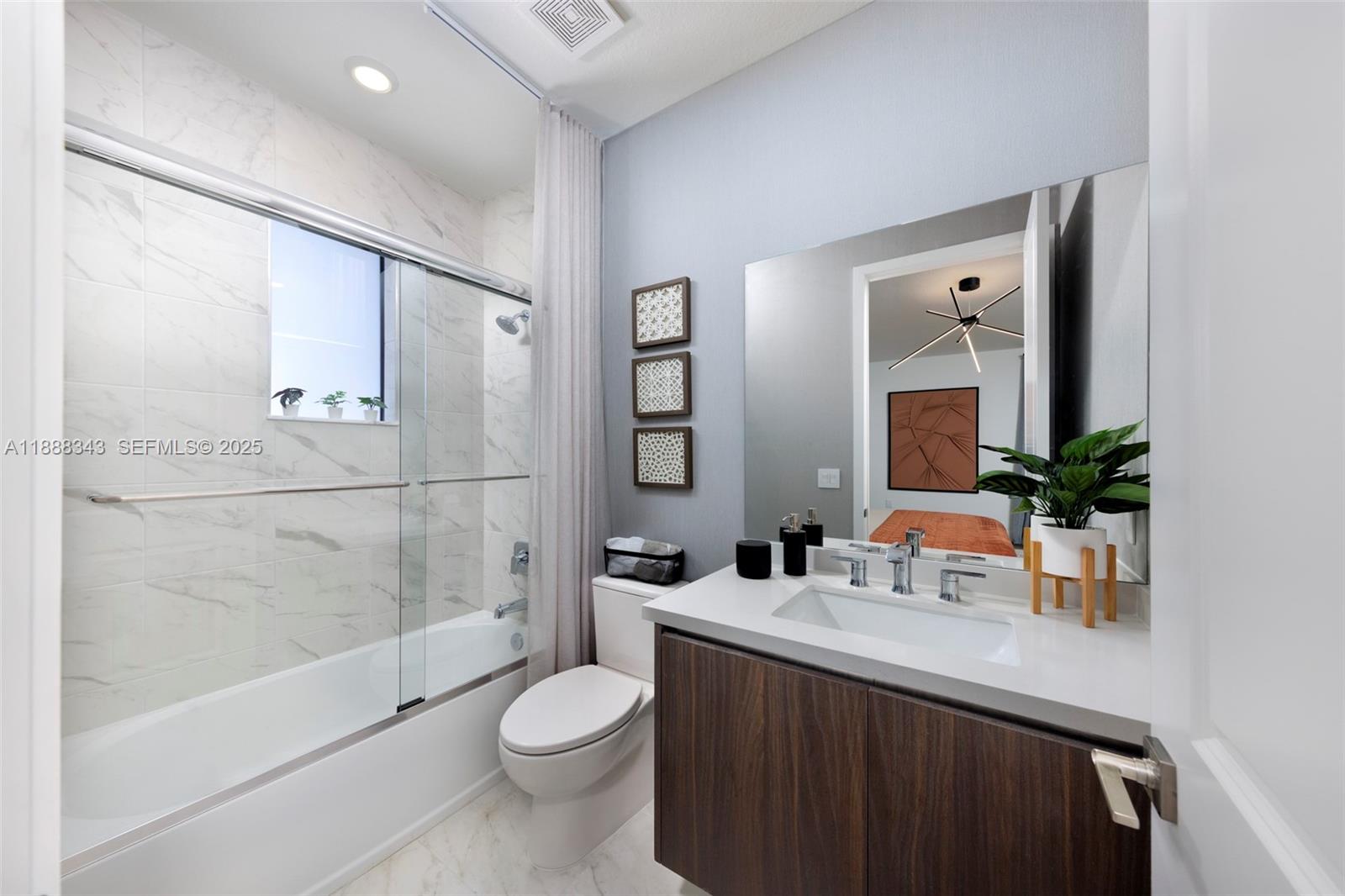 8259 Southwest 120th Terrace Miami, FL 33156 - Photo 15 of 25 a bathroom with a sink a toilet and shower