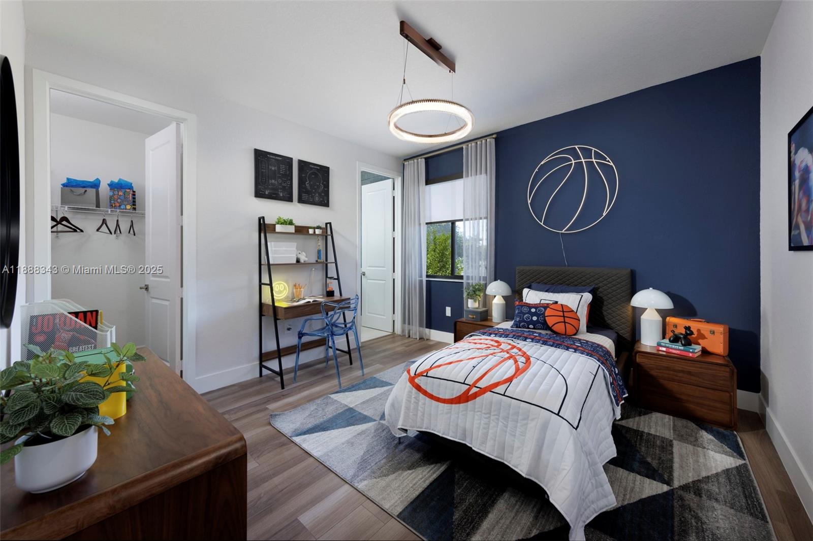 8259 Southwest 120th Terrace Miami, FL 33156 - Photo 16 of 25 a bedroom with a bed and a chandelier