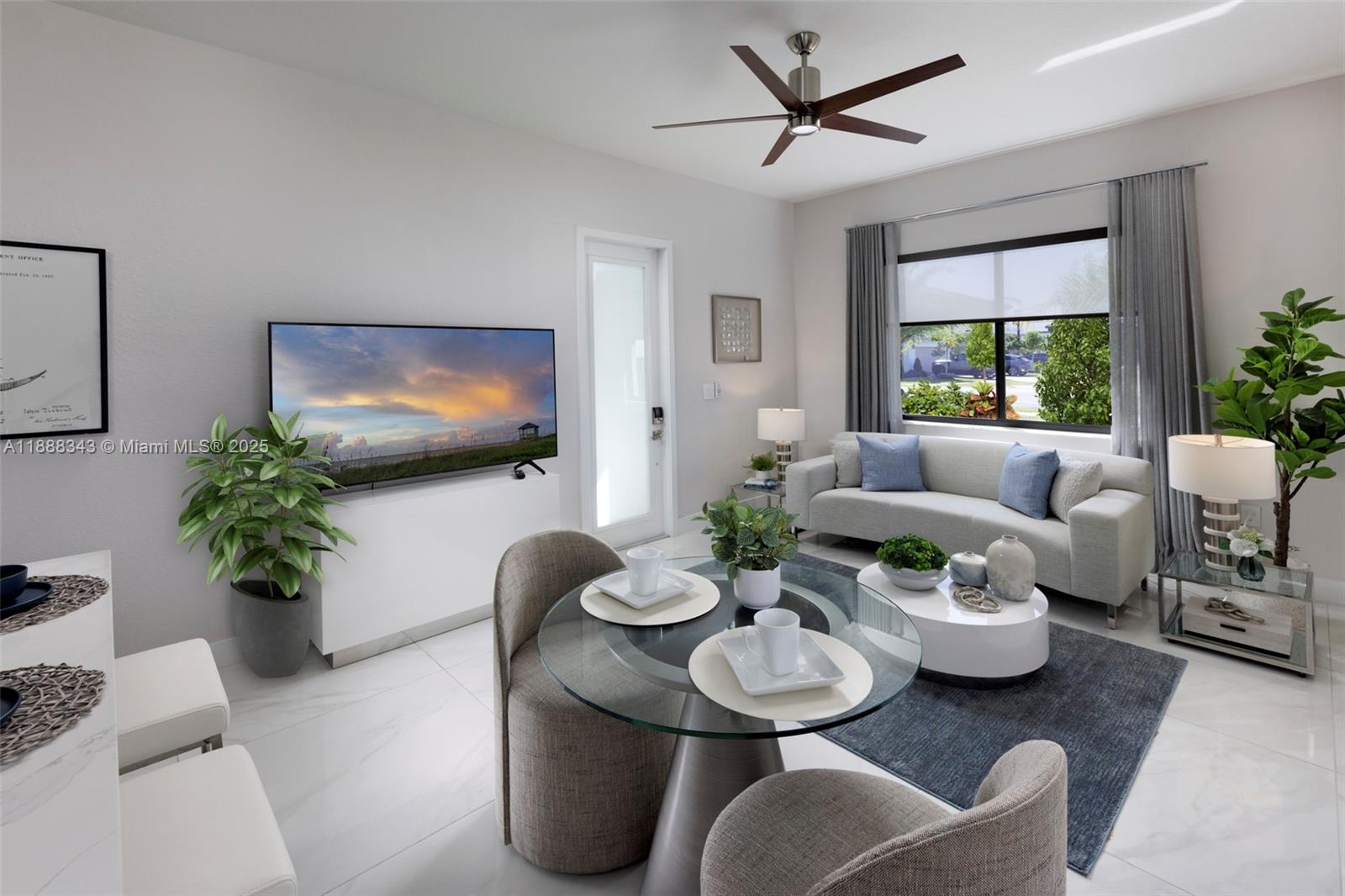 8259 Southwest 120th Terrace Miami, FL 33156 - Photo 23 of 25 a living room with furniture and a flat screen tv