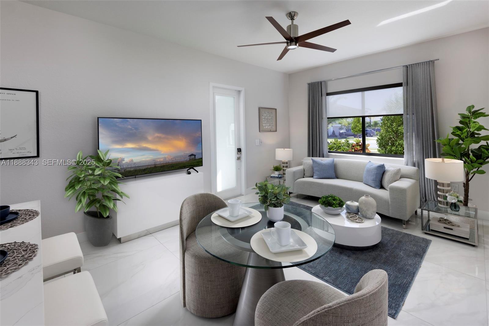 8259 Southwest 120th Terrace Miami, FL 33156 - Photo 23 of 25 a living room with furniture and a flat screen tv