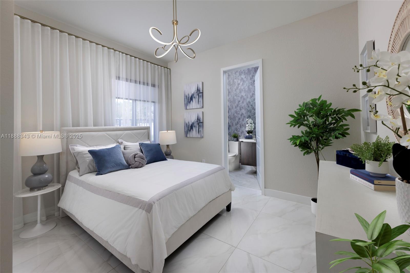 8259 Southwest 120th Terrace Miami, FL 33156 - Photo 24 of 25 a bedroom with a large bed and a potted plant