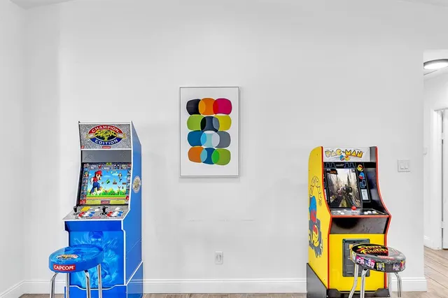 a kitchen with stainless steel appliances a stove a sink and a refrigerator