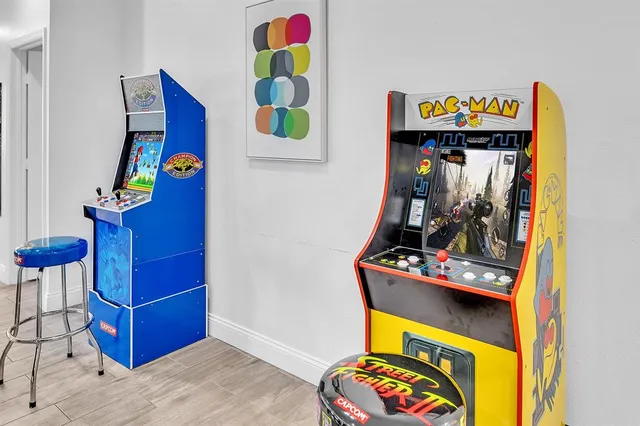 a kitchen with a refrigerator and a sink