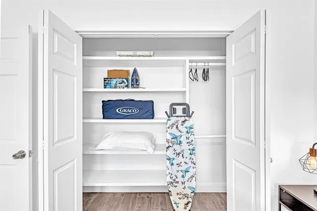 a outdoor space with a couch and a potted plant