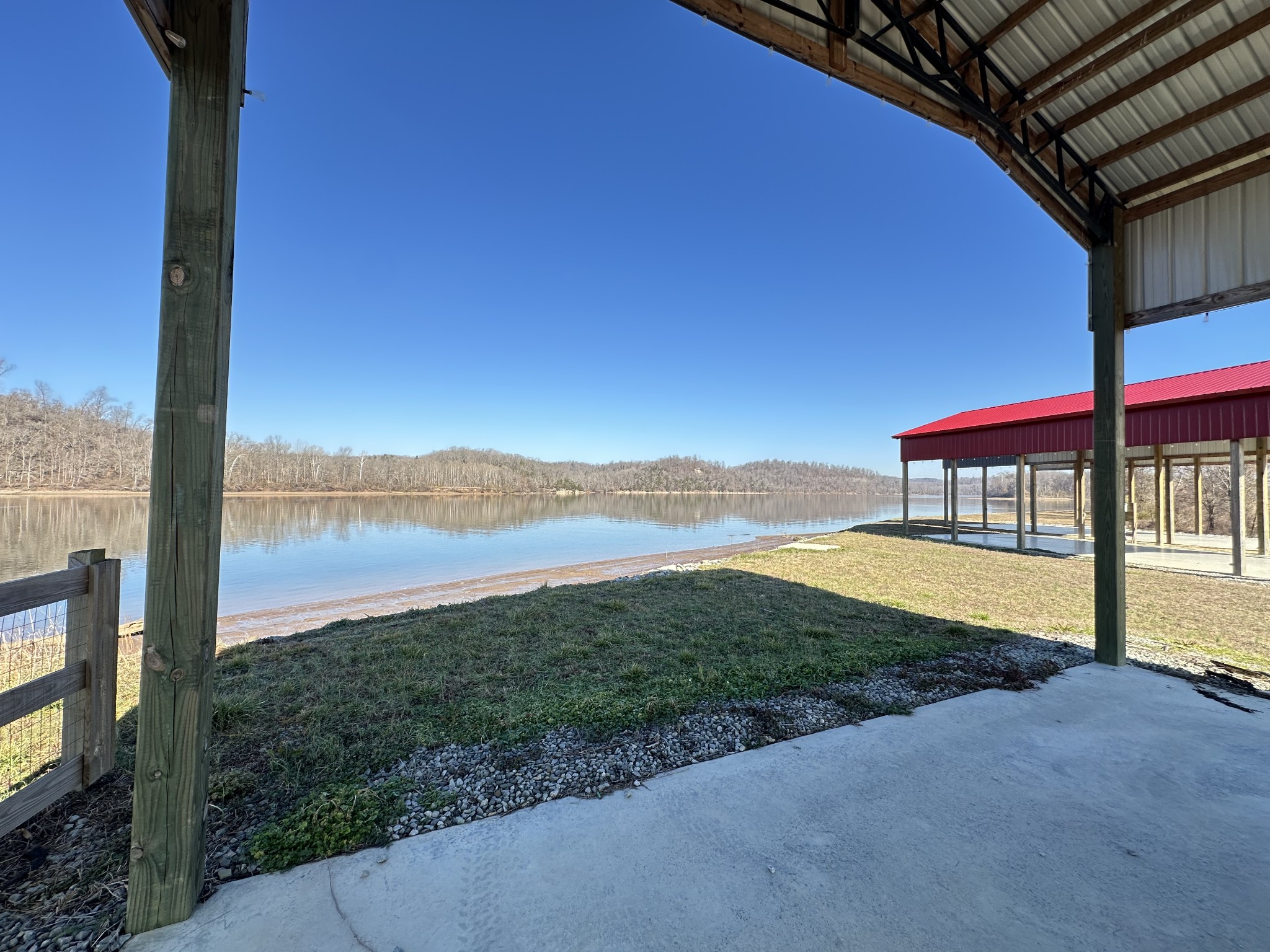 2287 Hardin Bottom River Road Clifton, TN 38425 - Photo 18 of 32 a view of a lake with a big yard