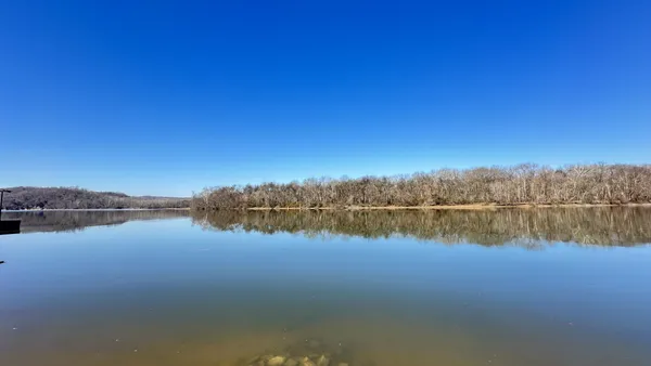 a view of a lake with a mountain in the background