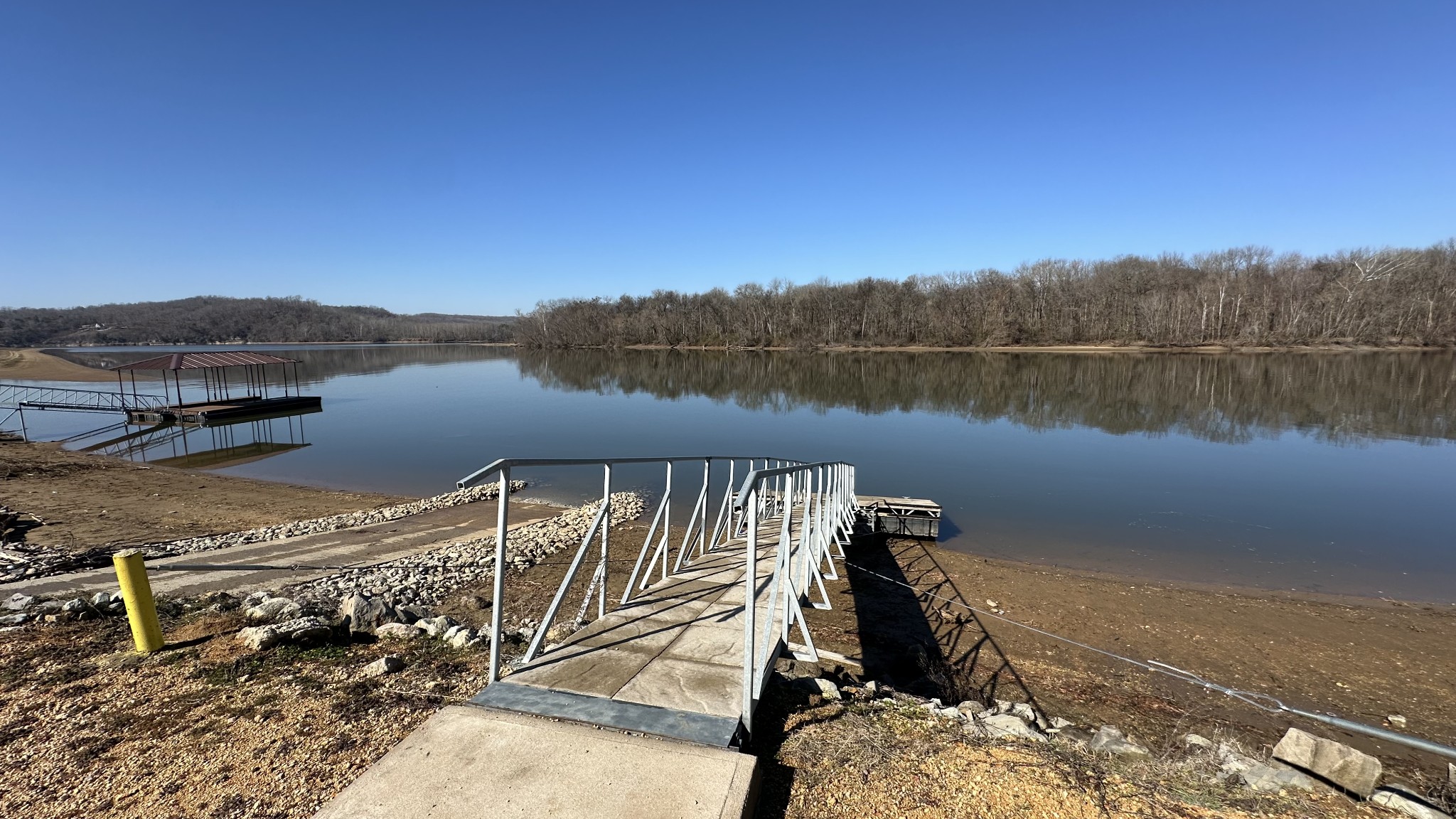 2287 Hardin Bottom River Road Clifton, TN 38425 - Photo 28 of 32 a view of a lake with a mountain in the background