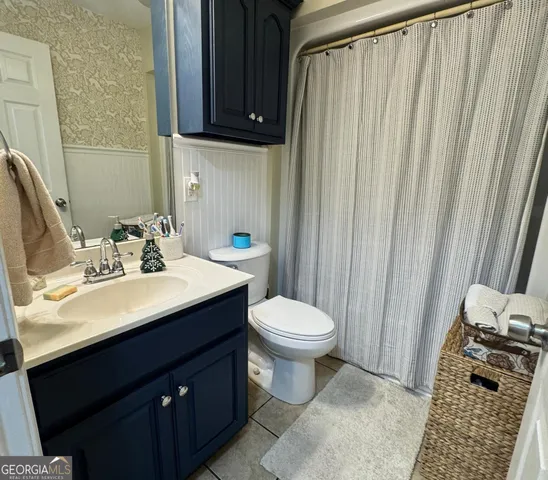 a bathroom with a sink and a toilet