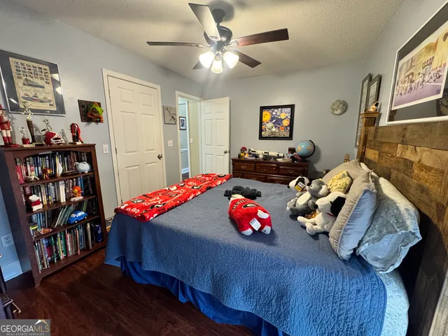 a bedroom with furniture and a bed