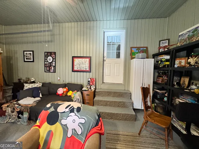 a view of a patio with wooden floor