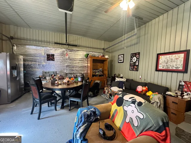 a view of outdoor space with deck and trees