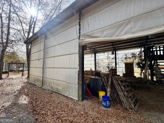 a view of a backyard of the house