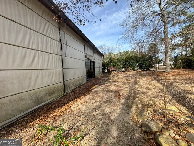 a view of a street with trees