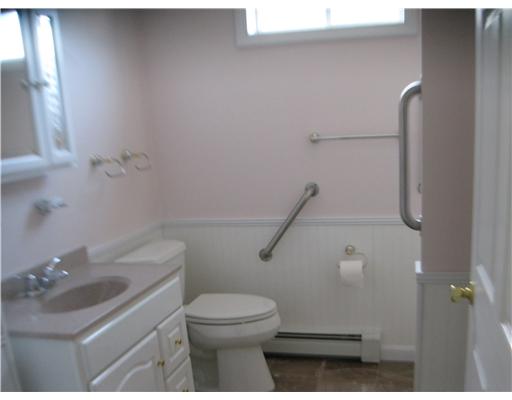 66 Glenbrook Road Warwick, RI 02889 - Photo 15 of 18 Bathroom. in law bathroom has grab bars, & wide shower stall