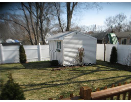 66 Glenbrook Road Warwick, RI 02889 - Photo 4 of 18 Exterior Back. Back yard has a shed for your lawn tools