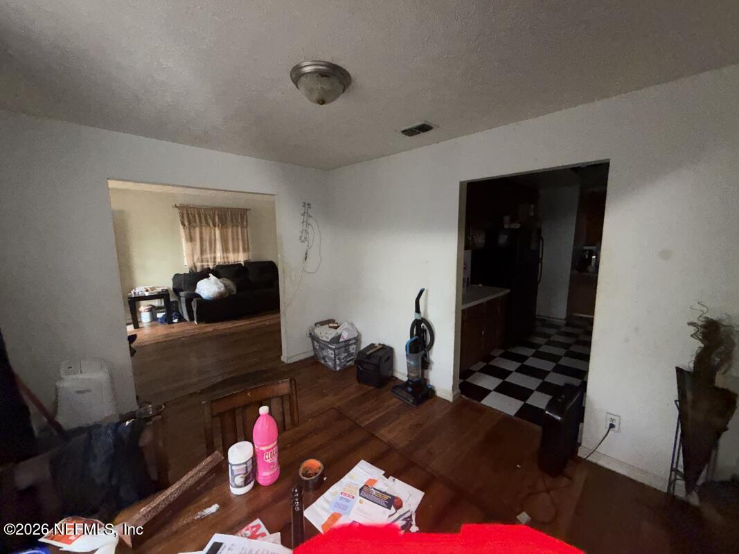 1926 Spring Drive Road Jacksonville, FL 32209 - Photo 15 of 19 a living room with furniture and a dresser