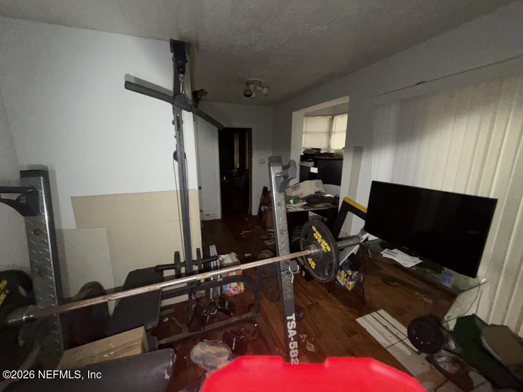 1926 Spring Drive Road Jacksonville, FL 32209 - Photo 16 of 19 a view of a room with gym equipment