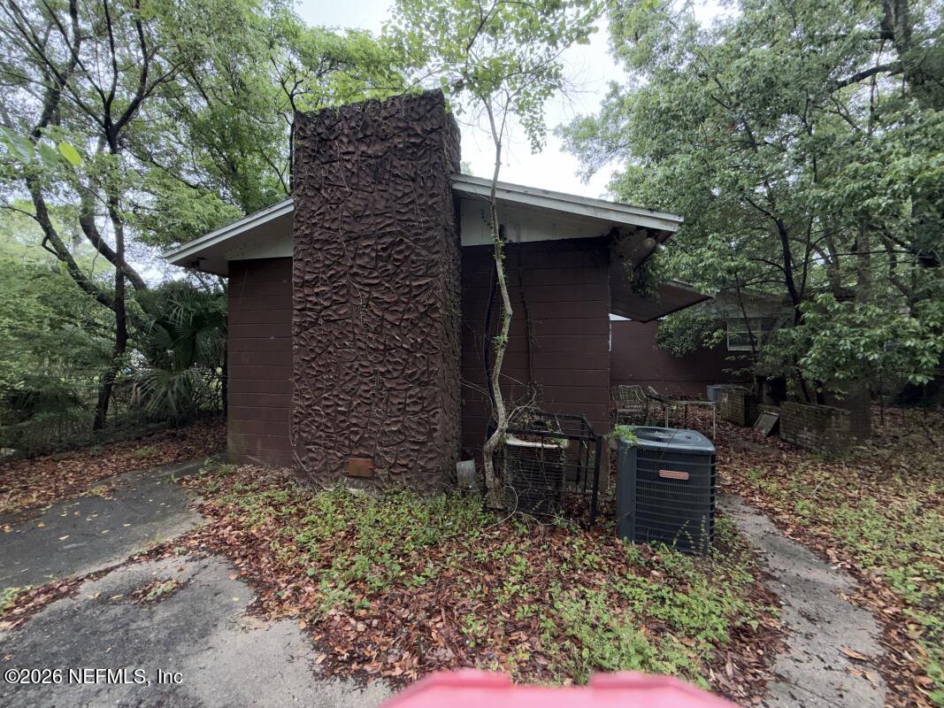 1926 Spring Drive Road Jacksonville, FL 32209 - Photo 18 of 19 a backyard of a house with outdoor seating