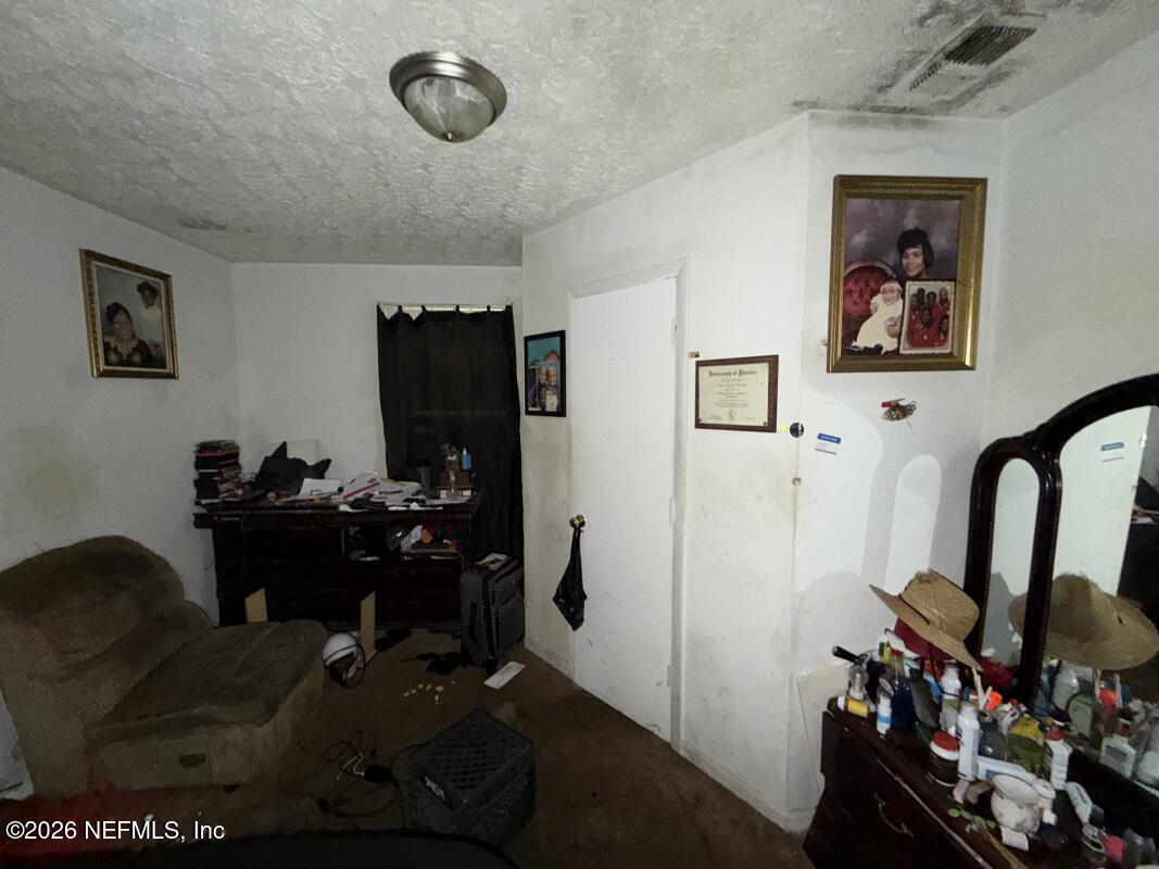 1926 Spring Drive Road Jacksonville, FL 32209 - Photo 4 of 19 a view of a workspace with furniture