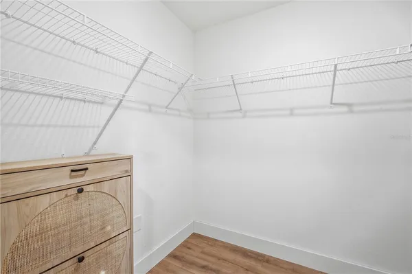 a view of a room with racks on the wall