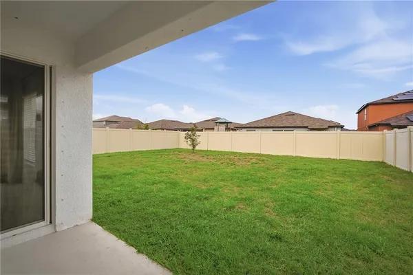 a view of an outdoor space and a yard
