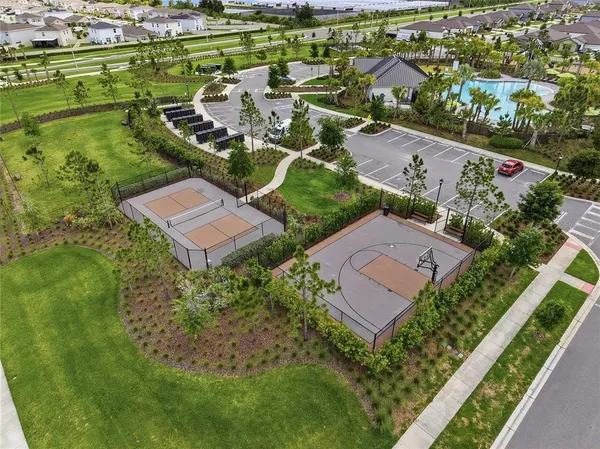 an aerial view of a house with a garden