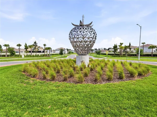 a view of a lake with a big yard