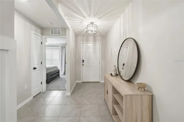 a view of hallway with washer and dryer