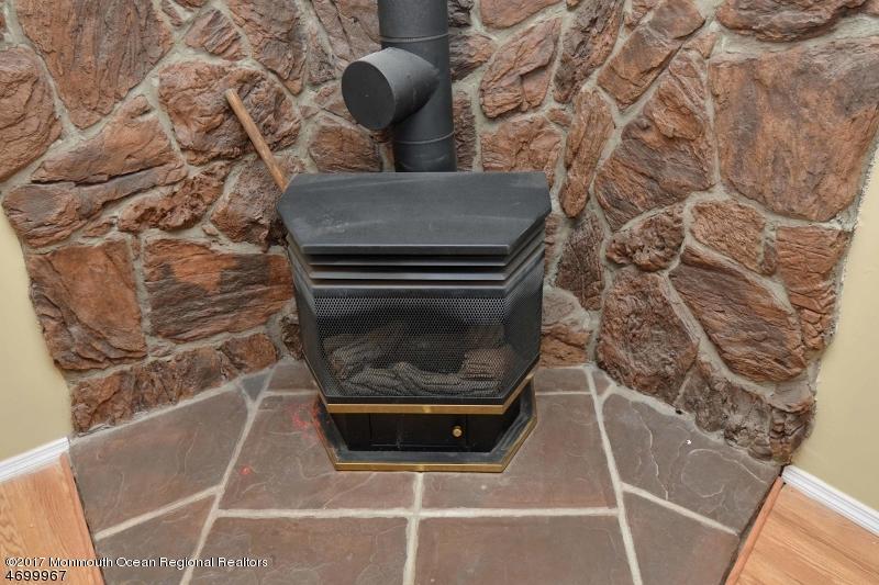 5 D Brookside Heights, Unit 102 Wanaque, NJ 07465 - Photo 8 of 15 a stove top oven sitting inside of a house
