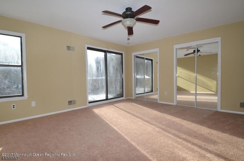 5 D Brookside Heights, Unit 102 Wanaque, NJ 07465 - Photo 10 of 15 a view of an empty room with a window
