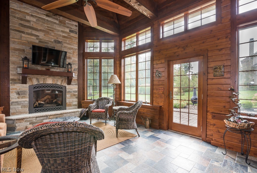 16277 Snyder Road Chagrin Falls, OH 44022 - Photo 20 of 35 The sunroom has fir beams and tongue & groove woodwork throughout with access to the patio