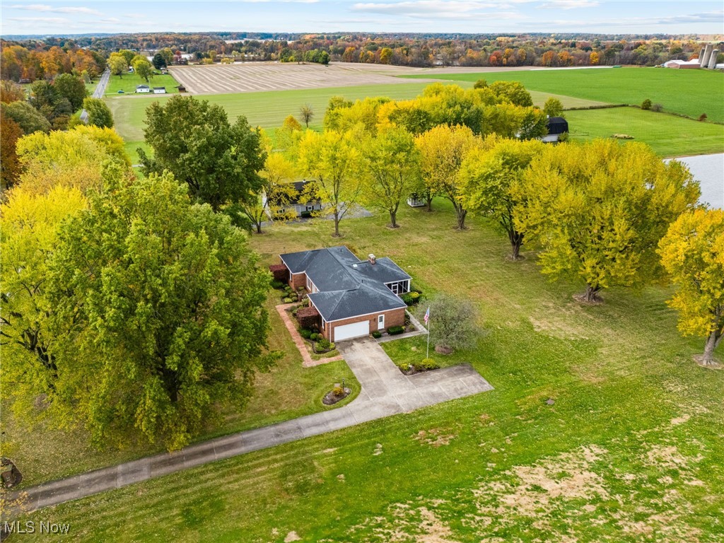 14265 Reeder Avenue Northeast Alliance, OH 44601 - Photo 39 of 39 Overview of rural landscape with rows of crops and a tree filled landscape