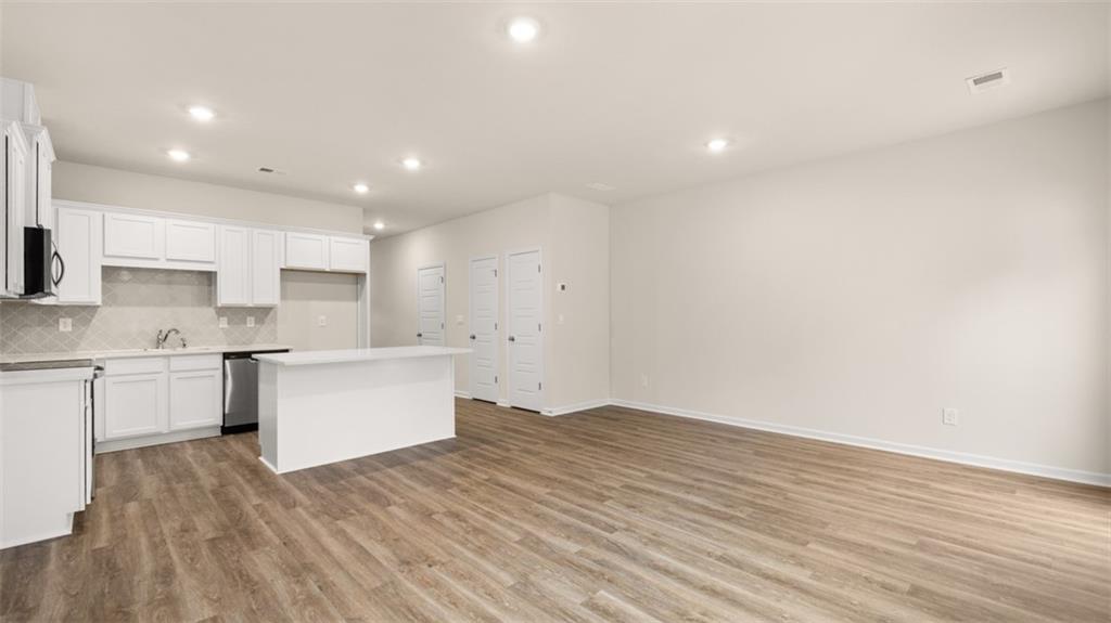 208 Kenmore Circle Perry, GA 31069 - Photo 2 of 6 a view of kitchen with wooden floor