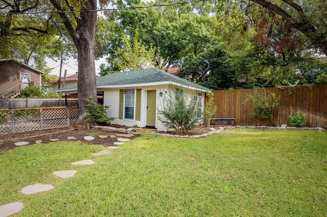 a bed room with furniture and a table