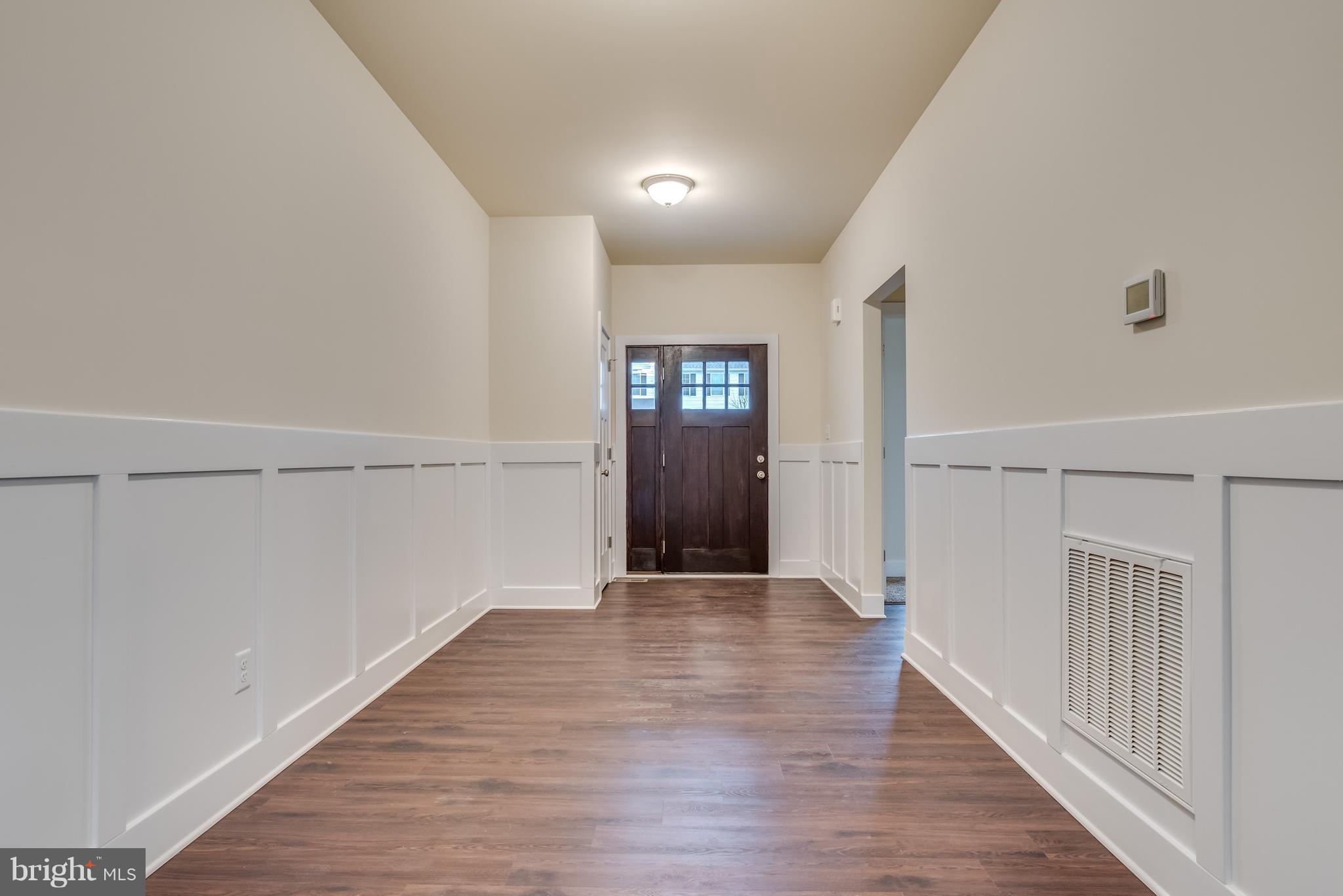 1260 Riparian Drive Falling Waters, WV 25419 - Photo 2 of 36 This grand foyer makes a statement